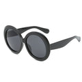 Sunglasses with large round frames