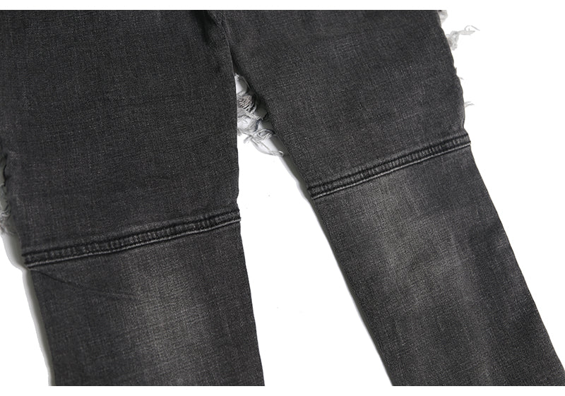 Tailored hole patch jeans